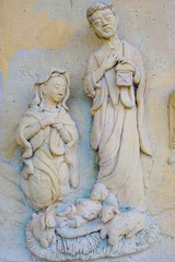 Low relief of Vergin Mary and Jesus Christ in Phitsanulok School ,thailand.