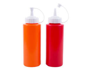 Ketchup and chili plastic bottle isolated on white background