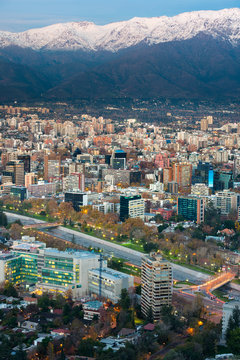 Panoramic view of Providencia district with Mapocho River and the snowed Andes mountain range in the back, Santiago, Metropolitan Region, Chile