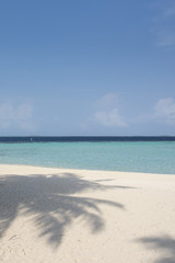 Fototapeta na wymiar Tropical beach at lagoon in Maldives