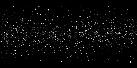 A glitter of silver particles on a black