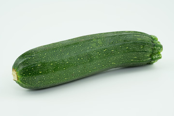 Organic homegrown green zucchini from my farm isolated on white background