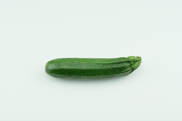 Organic homegrown green zucchini from my farm isolated on white background