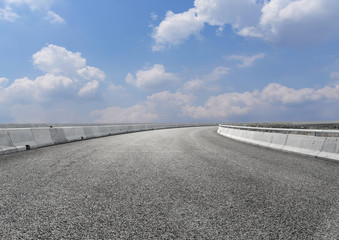 asphalt highway road under the blue sky