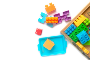 Obraz premium Toy colorful plastic blocks isolated on white background
