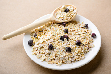 Tasty healthy and dietary breakfast: homemade oatmeal with black