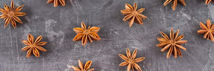 star anise on a gray background