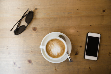 Latte coffe on a wooden table