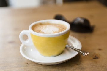 Latte coffe on a wooden table