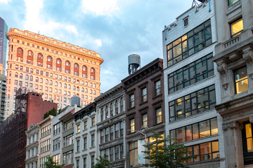 Historic buildings along 23rd Street in Manhattan New York City at dusk