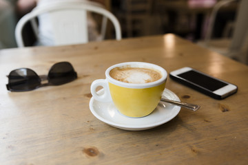 Latte coffe on a wooden table