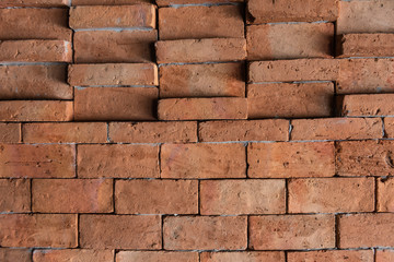 Fototapeta premium Closeup wall texture, Orange Brick wall for pattern and background.