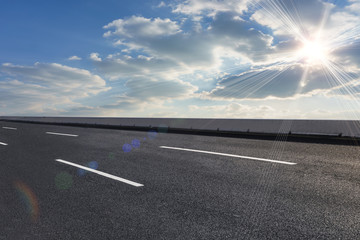 Asphalt road and sky cloud landscape