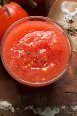 Fresh tomato juice with salt and pepper 
