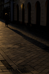 Woman Long Shadow in City