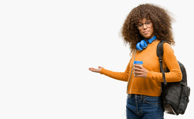 African american student woman confident and happy with a big natural smile inviting to enter