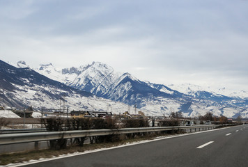 Mountain peaks along the road.