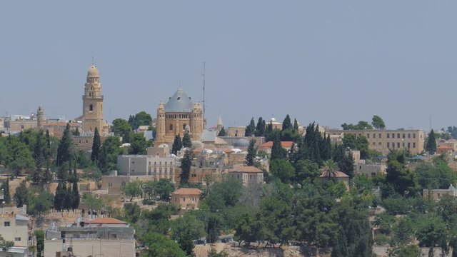 Far view to Dormitsion abbey and church in Jerusalem on Mount Zion flicker in hot air