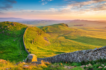 Golden Light at Hadrian's Wall Caw Gap / Hadrian's Wall is a World Heritage Site in the beautiful Northumberland National Park. Popular with walkers along the Hadrian's Wall Path and Pennine Way
