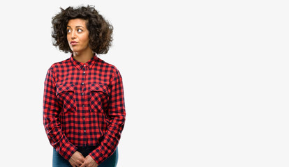 Beautiful arab woman doubt expression, confuse and wonder concept, uncertain future