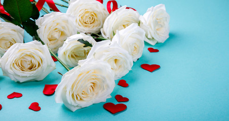 White Rose Heart Shape Red Ribbon on the Colorful Holiday Background Valentine's Day Toned image Top View Copy space for Text Flat Lay