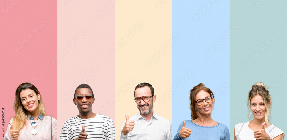 Sticker Mixed group of people, women and men smiling broadly showing thumbs up gesture to camera, expression of like and approval