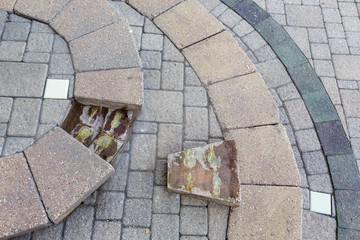 Replacing a damaged paving stone in patio steps