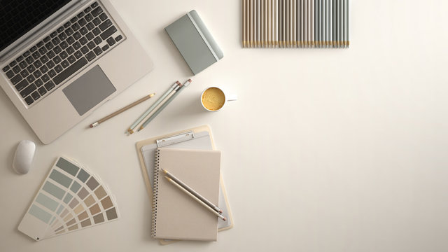 Stylish Minimal Office Table Desk. Workspace With Laptop, Notebook, Pencils, Coffee Cup And Sample Color Palette On White Background. Flat Lay, Top View