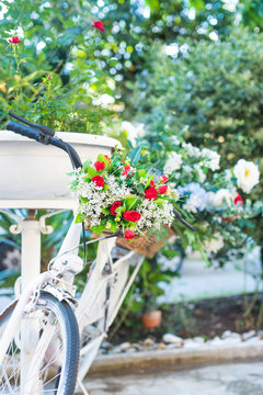 Vintage bicycle with flower romantic spring garden decor