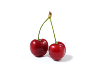 Fruits of a sweet cherry on a white background. Front view.