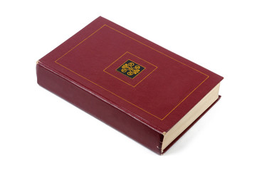 Red book on white background. View from above.