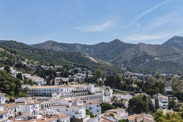 Obraz premium Beautiful aerial view of Mijas - Spanish hill town overlooking the Costa del Sol, not far from Malaga. Mijas known for its white-washed buildings. Mijas, Andalusia, Spain.