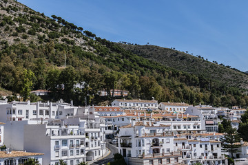 Obraz premium Beautiful aerial view of Mijas - Spanish hill town overlooking the Costa del Sol, not far from Malaga. Mijas known for its white-washed buildings. Mijas, Andalusia, Spain.