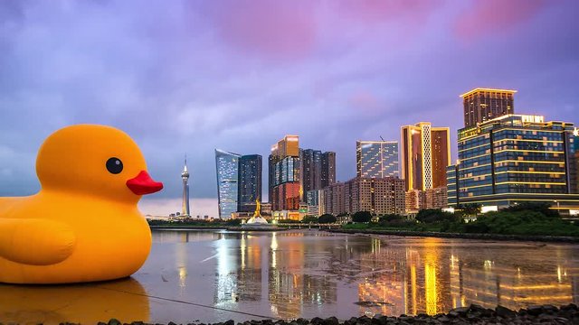 4K Timelapse of Macau city with yellow duck,  China