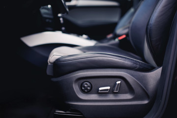 buttons for electric adjustment of seats in a modern car