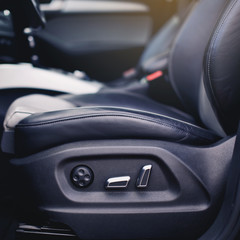 buttons for electric adjustment of seats in a modern car