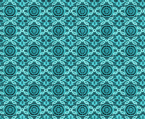 Seamless pattern in the form of turquoise lace on a black background. Lace with geometric motifs.