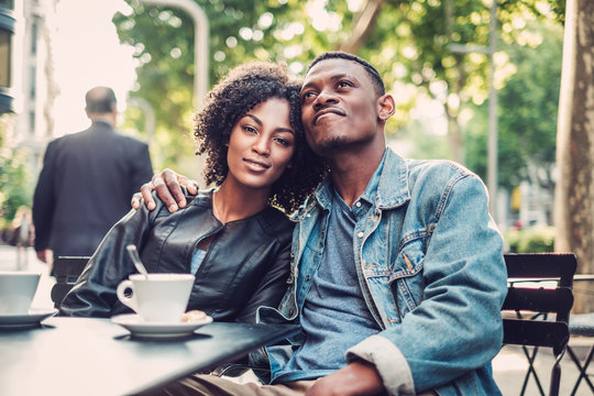 Young happy black couple outdoors