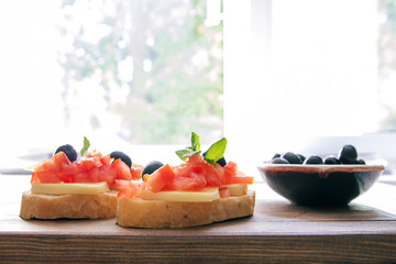 Italian brochettes tomatoes black olives Flat lay natural healthy vegetarian food