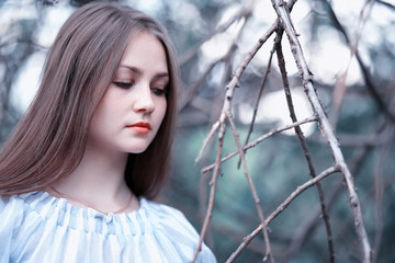 A girl in a spring green park