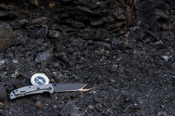Obraz premium Knife and compass. A lot of space. Items for survival. Front.