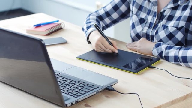 Young Woman Graphic designer at work