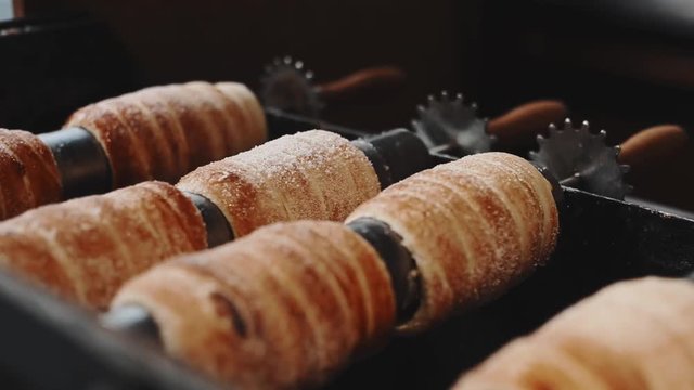 Czech national street food called trdlo trdelnik is being cooked during Christmas time and all year too.