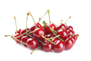 A lot of red, ripe, fresh cherries on a white background. isolated