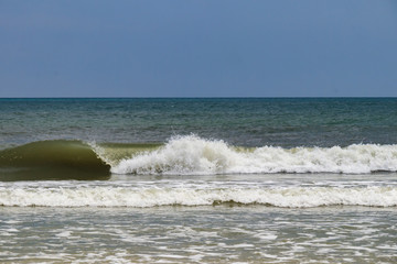 Waves breaking on the beach