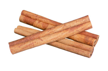Cinnamon sticks close-up macro on white background isolation