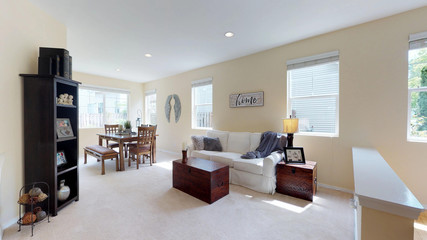 Light filled living space in beautiful two story home.