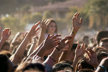 Crowded people hands up