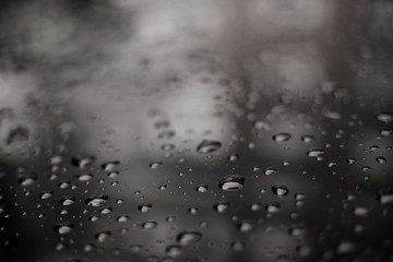 Drops of water on a glossy surface