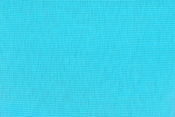 Blue fabric texture background. Empty abstract cloth backdrop